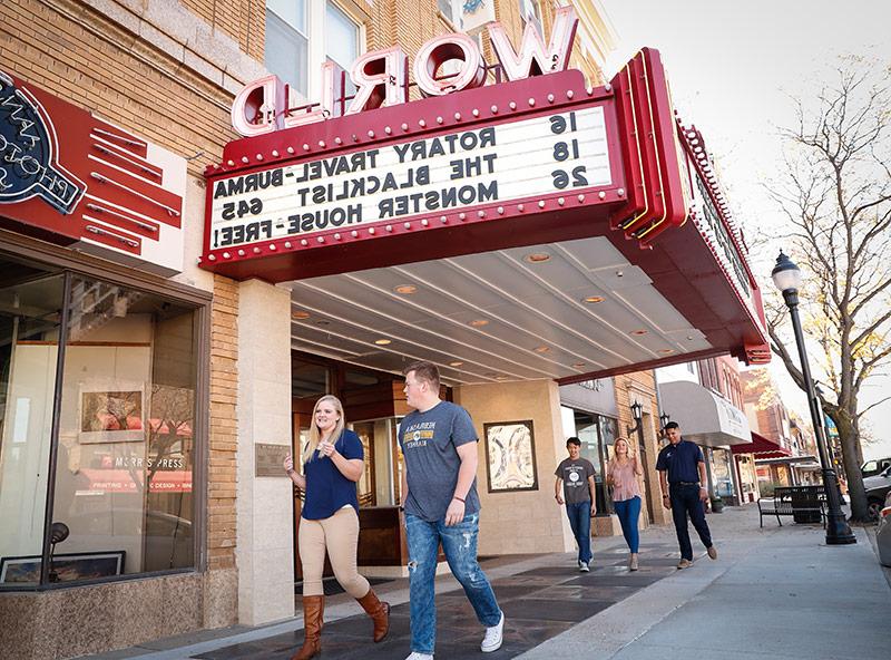 Students in front of the world theatre